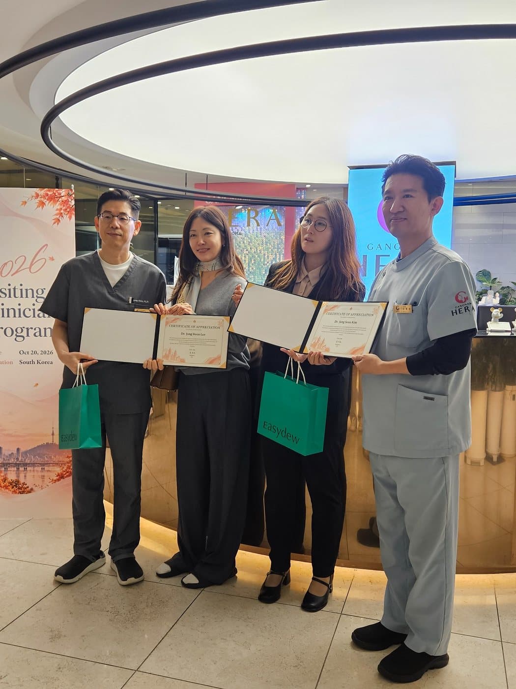 HERA doctors with certificates of appreciation