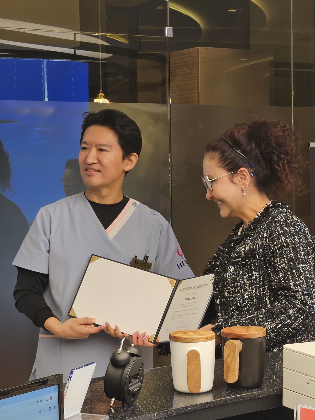Certificate presentation to visiting Brazilian physicians at HERA Clinic